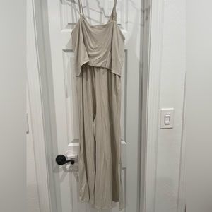 Beige jumpsuit from Pinkblush Maternity  size medium. Spaghetti strap.